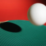 Tennis paddle and ball